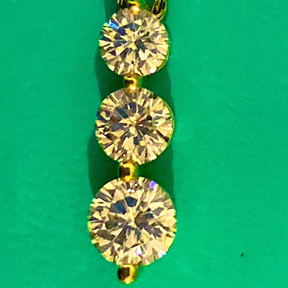 “D” &IF” Leo Diamonds 18k pendant on 14kchain